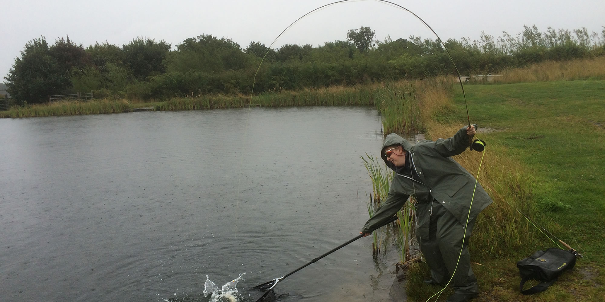Get Fishing - Fly Fishing Landing a Fish